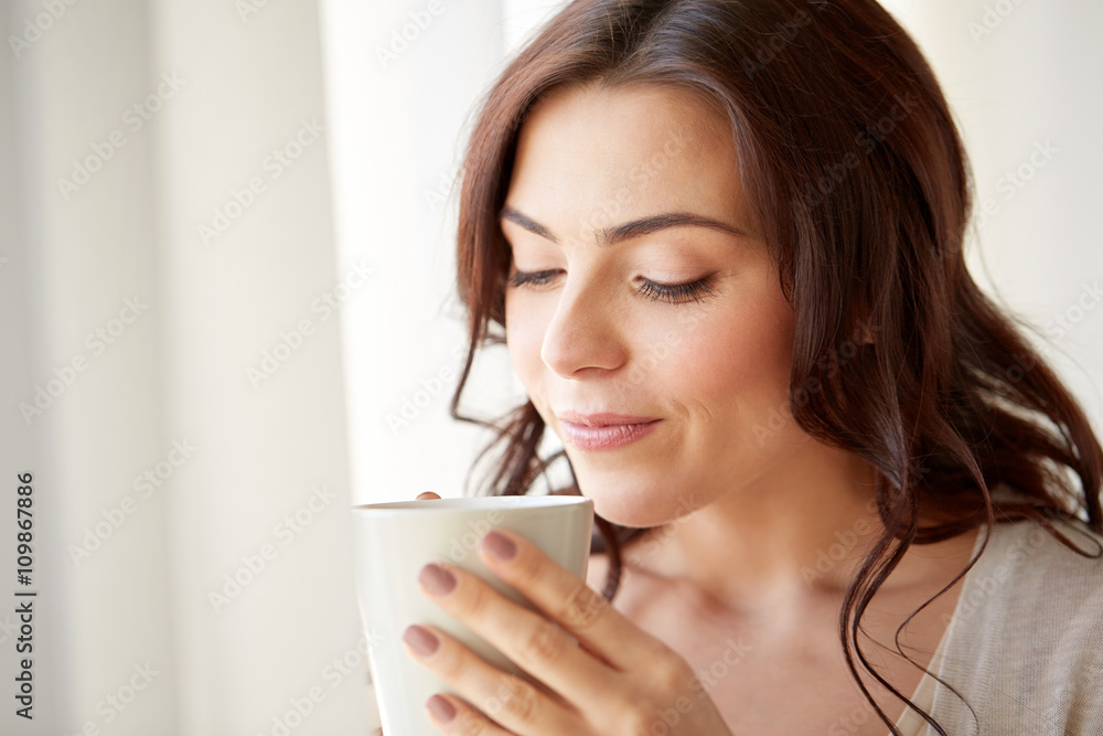 happy woman with cup of tea or coffee at home happy woman with cup of tea or coffee at home