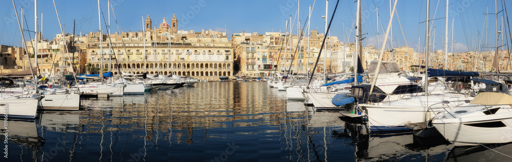 Sailing boats on Senglea marina in Grand Bay, Valetta, Malta