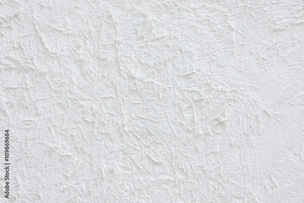 Obraz premium Blurred white stucco wall, abstract background.