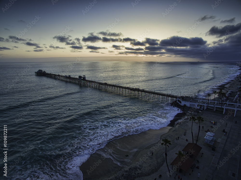 Oceanside pier at sunset. This is a single image aerial view from about 400'. Oceanside pier at sunset. This is a single image aerial view from about 400'.