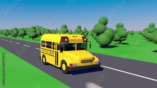 school bus traveling on the road back to school