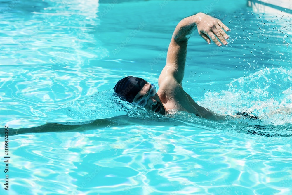 Fit swimmer doing the front crawl