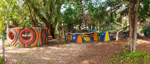 Panoramic view of the stone playground in the park on sunny day. photo