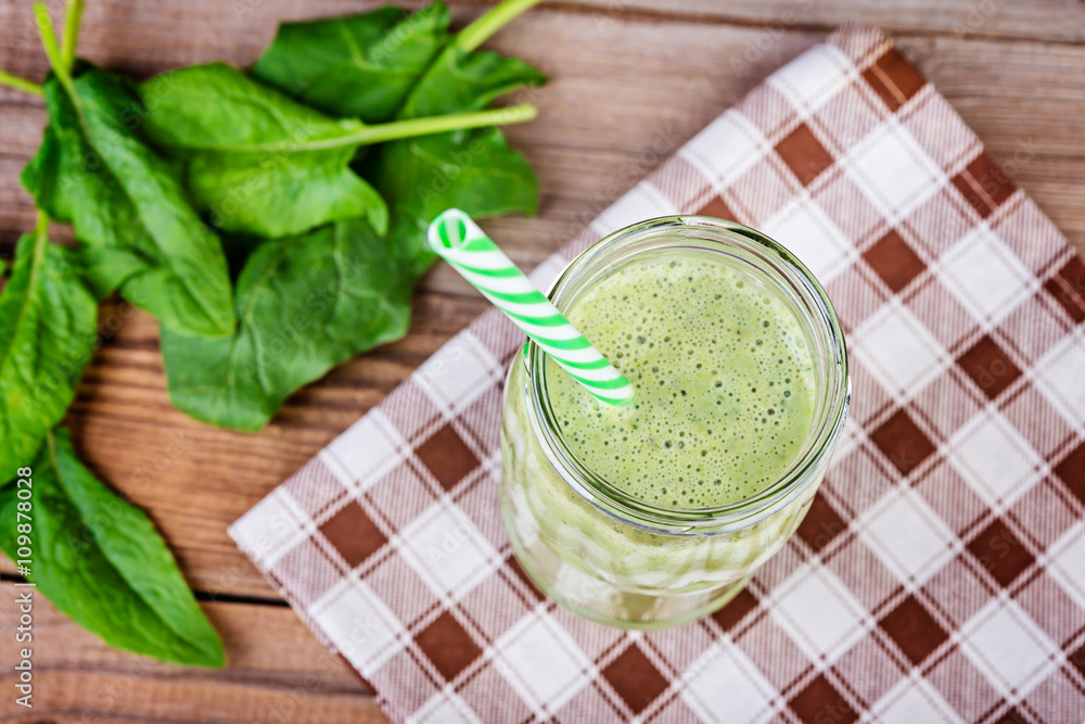 Healthy spinach smoothie on wooden rustic background Healthy spinach smoothie on wooden rustic background