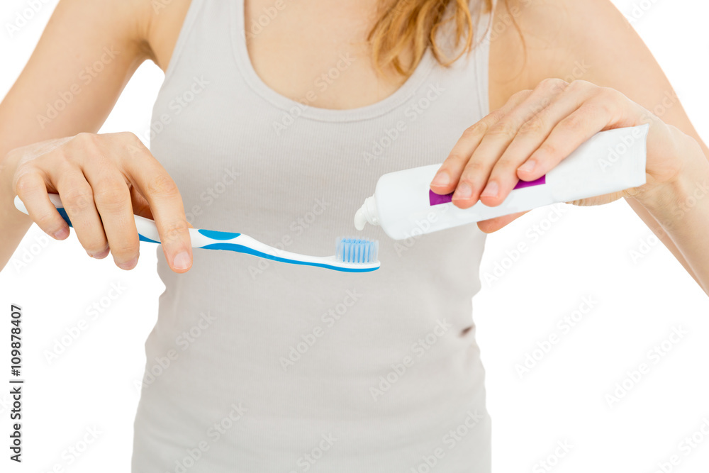 Woman with toothbrush and toothpaste Woman with toothbrush and toothpaste