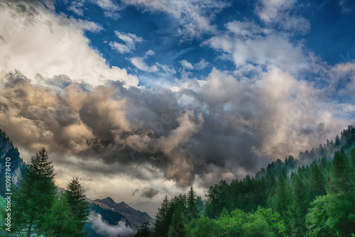 Cloudy sky over the forest © Massimo De Candido