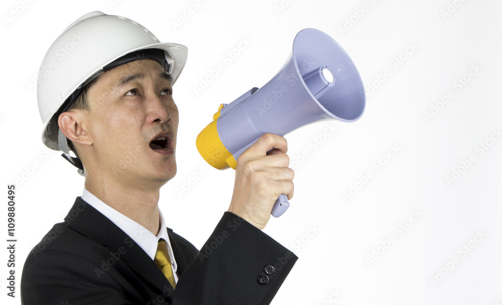 Young Asian Engineer Are activated via megaphone on white Young Asian Engineer Are activated via megaphone on white
