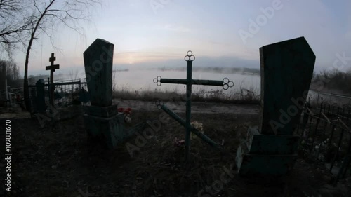 creepy cemetery monument in a fog photo