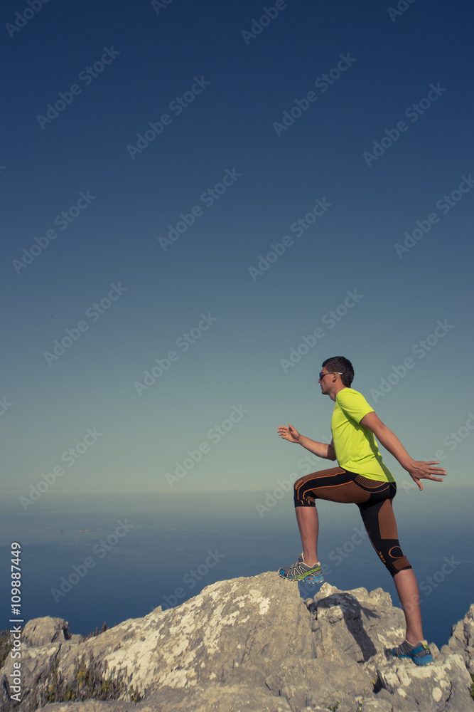 Running man in the summer in a beautiful location. Running man in the summer in a beautiful location.