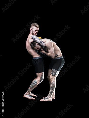 two wrestlers black isolated tattoo lock head