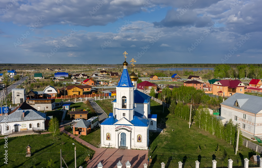 Bogandinskoe (Kilki), Russia - May 13, 2015: Aerial view on Sacred and Ilyinsky temple from helicopter.Tyumen region