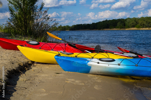 Fototapeta Naklejka Na Ścianę i Meble -  kayaks color on the small river