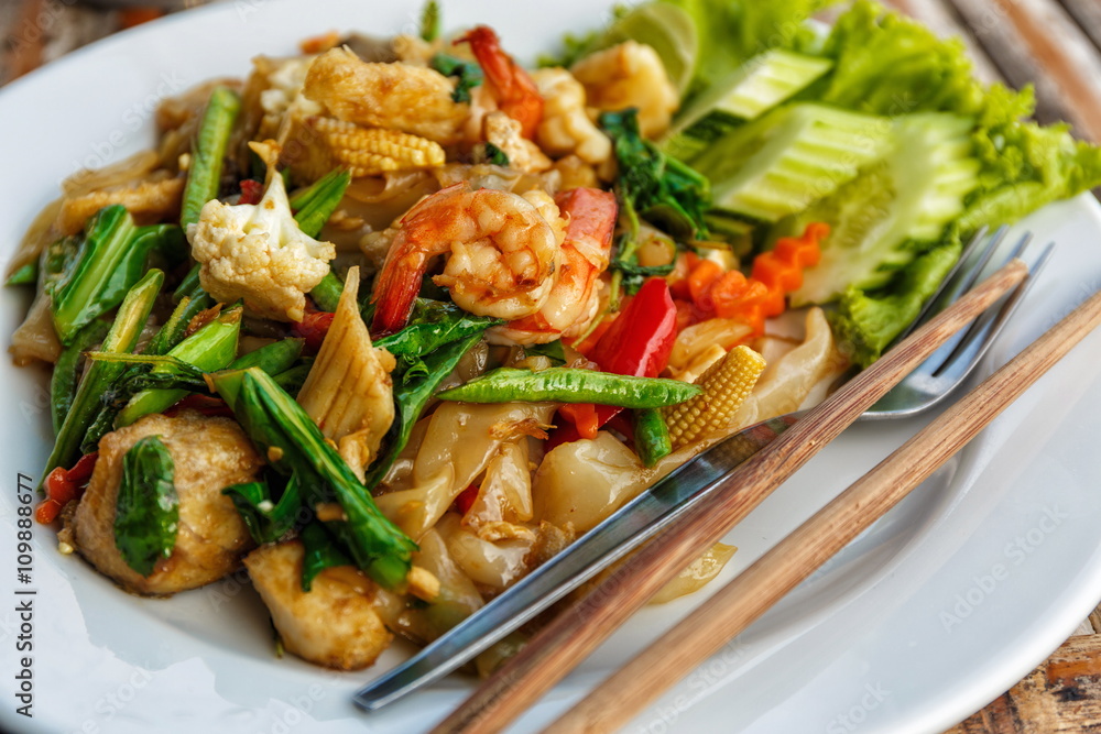 Fried vegetables and seafood in sauce Fried vegetables and seafood in sauce