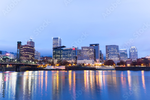 water cityscape and skyline of portland in blue sky