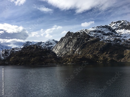 The magnificent Trollfjorden in Lofoten, Norway. A narrow fjord, only a hundred meters wide at it's narrowest point. But, even large cuise ships visit the fjord because of its marvelous views. 