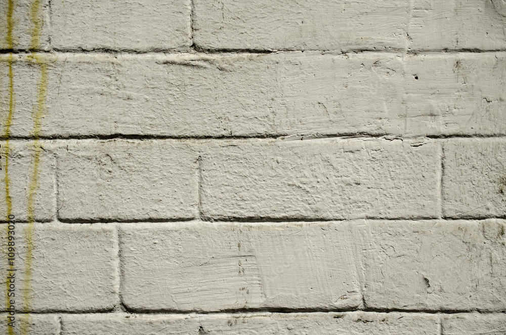 Old gray painted brick wall. Old gray painted brick wall.