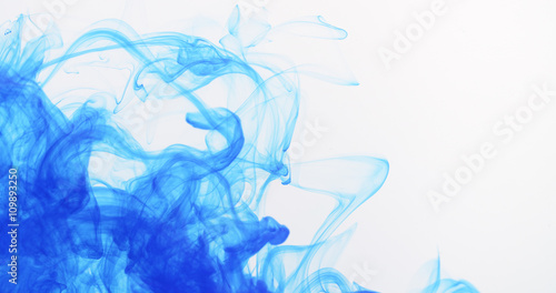 blue ink spreading in water, 4k photo