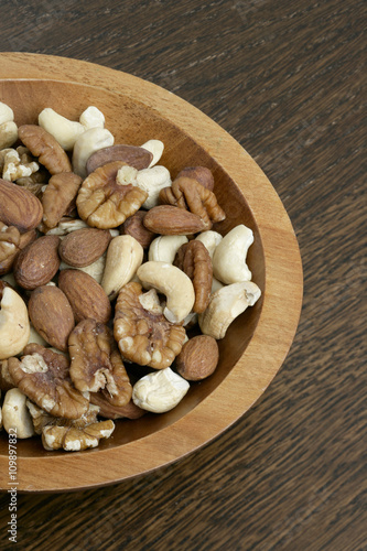 wooden bowl with mixed nuts