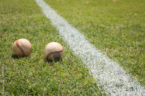 Baseball on a little league baseball field in spring
