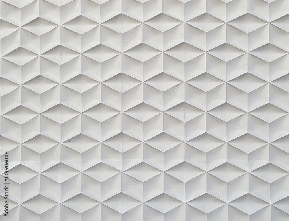White geometric cement wall background. White geometric cement wall background.