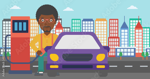 Man filling up fuel into car.