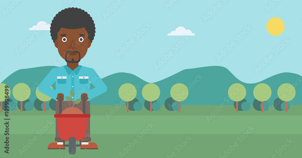 Obraz premium Man with plant and wheelbarrow.