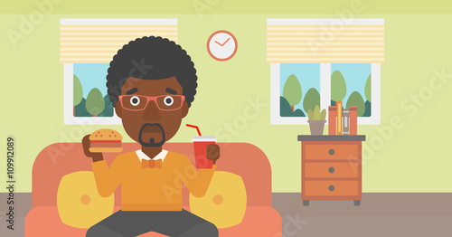 Man eating hamburger. 