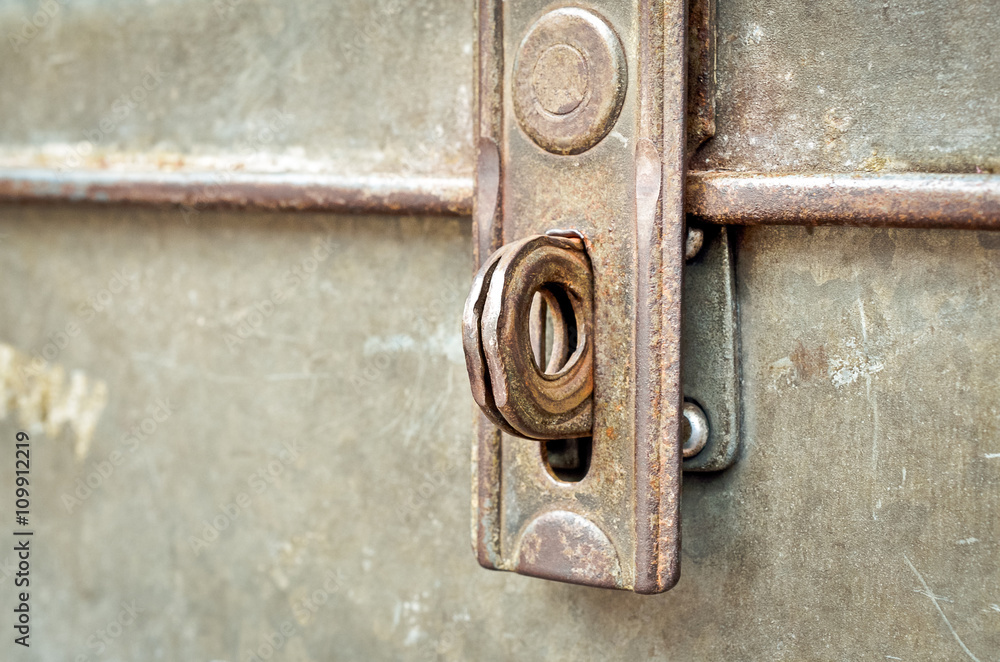 Selective focus and close up of rusted keyhole on steel casket, With place for your text Selective focus and close up of rusted keyhole on steel casket, With place for your text