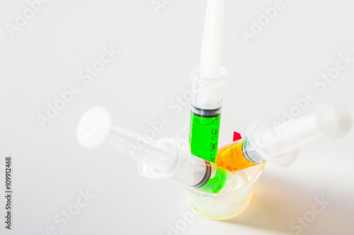 Syringe with syrup medicine use to feed for kids.