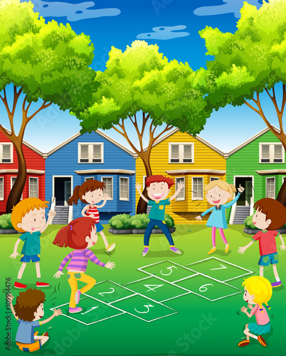 Children playing hopscotch in the yard