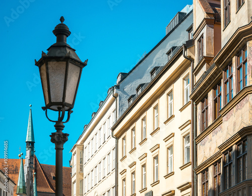 Traditional street view of old buildings in Munich, Bavaria, Ger © ilolab