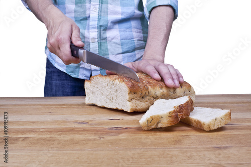 woman slicing bread loaf