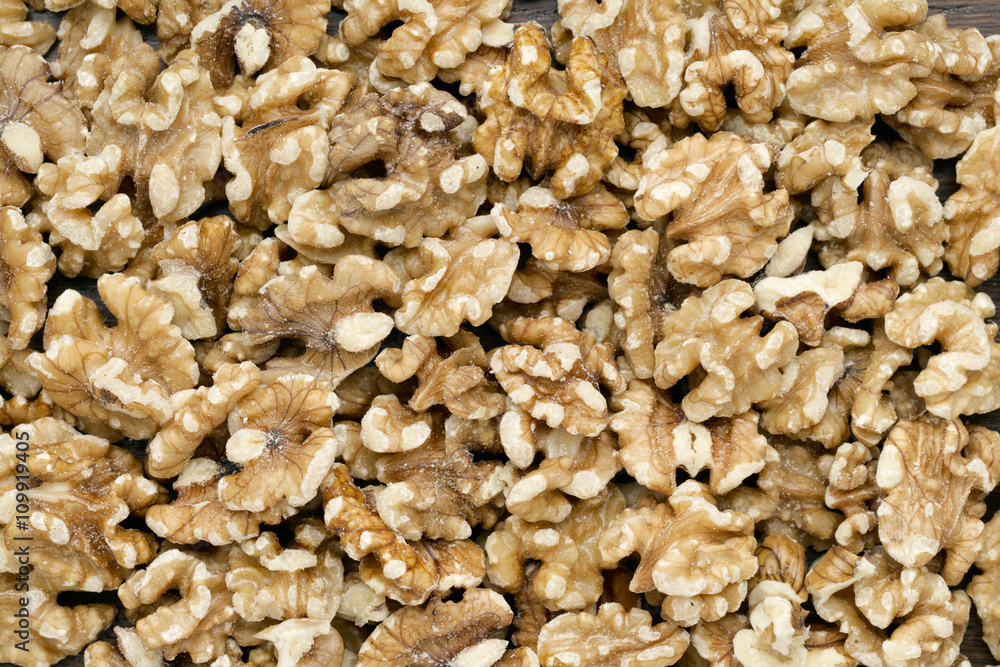 a heap of peeled walnuts a heap of peeled walnuts