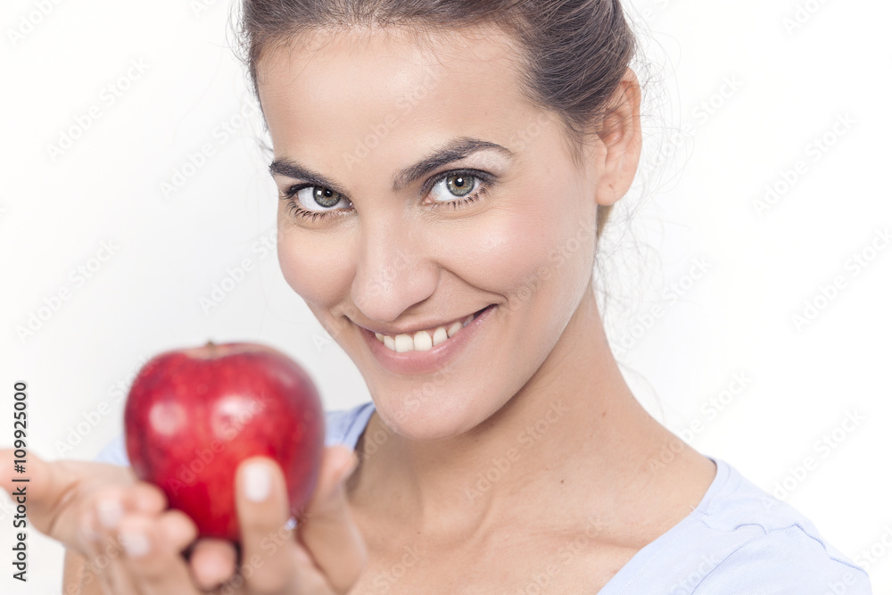Beautiful woman with red apple in hand Beautiful woman with red apple in hand