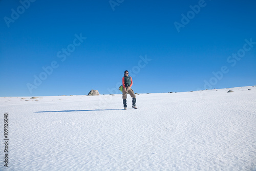 hiker woman standing in snow
