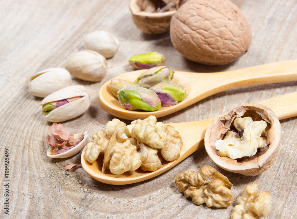 Closeup of a walnut and pistachios. Closeup of a walnut and pistachios.
