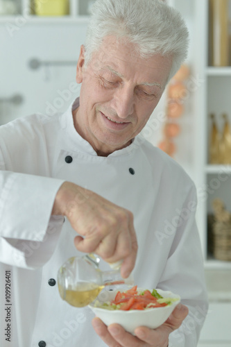 elderly male chef