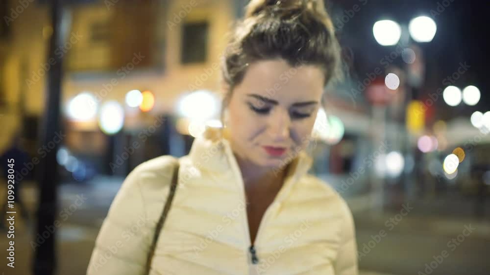 Beautiful woman standing in the city and texting on smartphone, steadycam shot
Beautiful woman standing in the city and texting on smartphone, steadycam shot