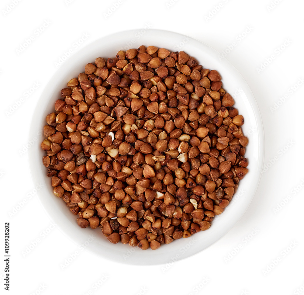 Bowl of buckwheat on white background, top view Bowl of buckwheat on white background, top view