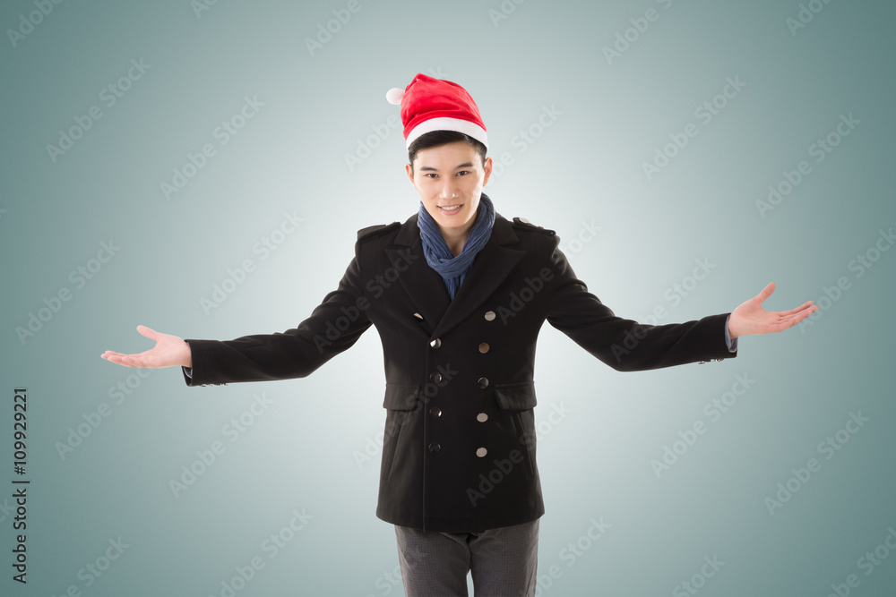 young man with christmas hat young man with christmas hat