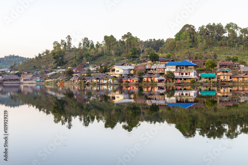 Countryside village and mountain reflection in northern Thailand © Phat