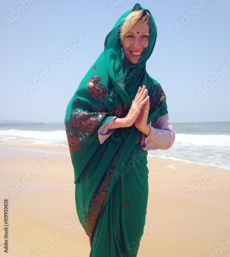 white woman in traditional indian sari woth bindu on forehead