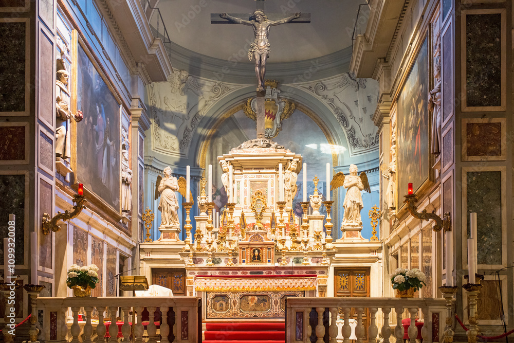 Altar with crucifix in Chiesa di Ognissanti church in Florence, Italy