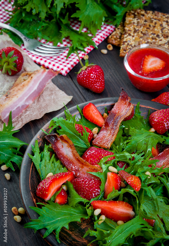 Useful strawberry salad with arugula, nuts and bacon, berry sauce Useful strawberry salad with arugula, nuts and bacon, berry sauce
