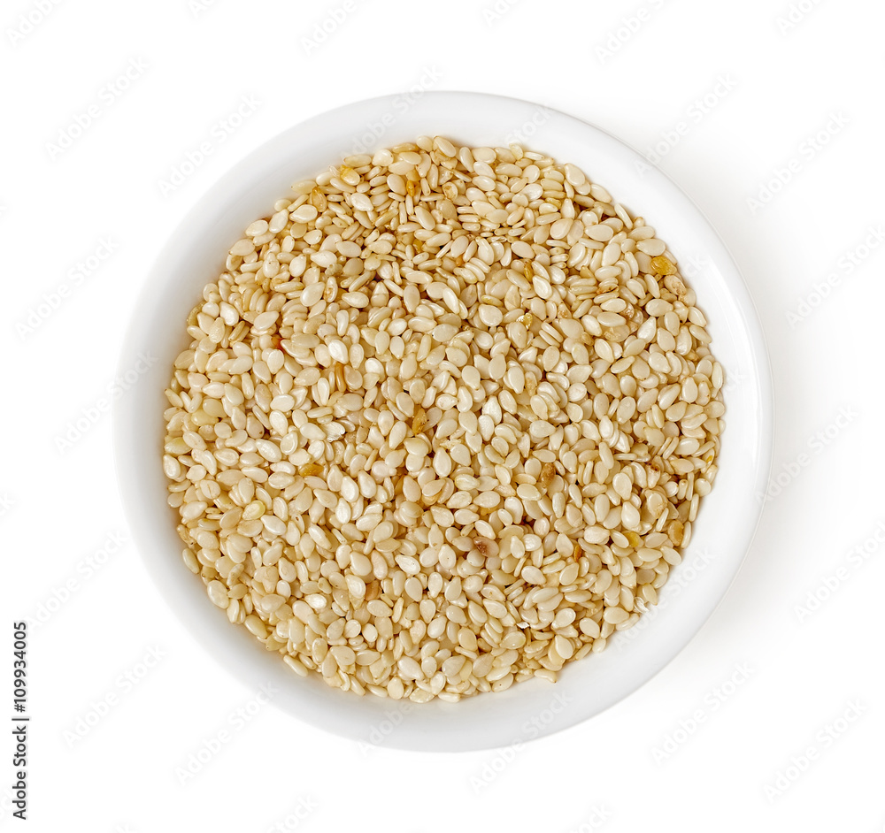 Bowl of flax seeds isolated on white, top view Bowl of flax seeds isolated on white, top view