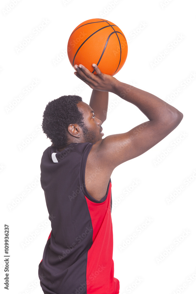 African basketball player from the back, isolated on white backg