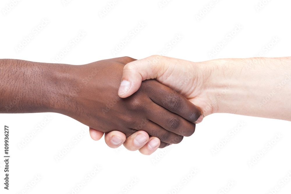 African man's hand shaking white man's hand, isolated on white b