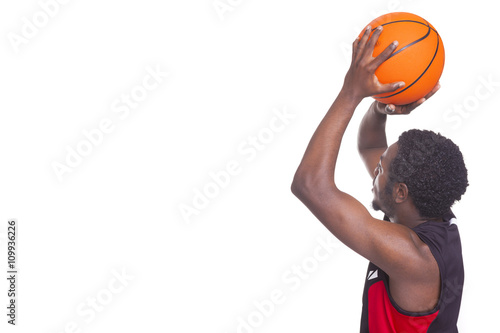 African basketball player with a ball, isolated on white backgro