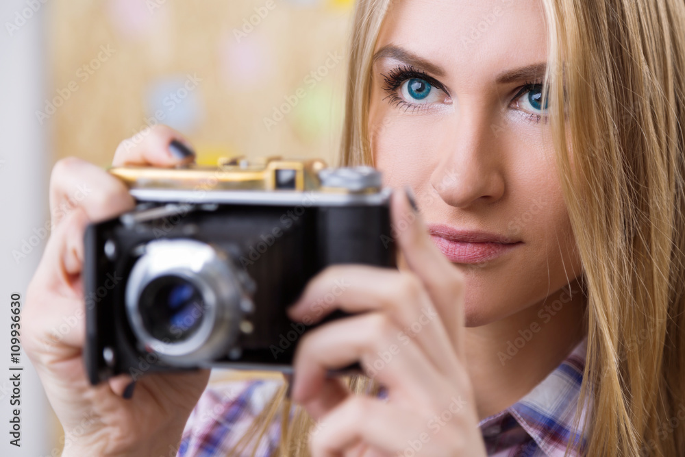 Caucasian female with retro camera Caucasian female with retro camera