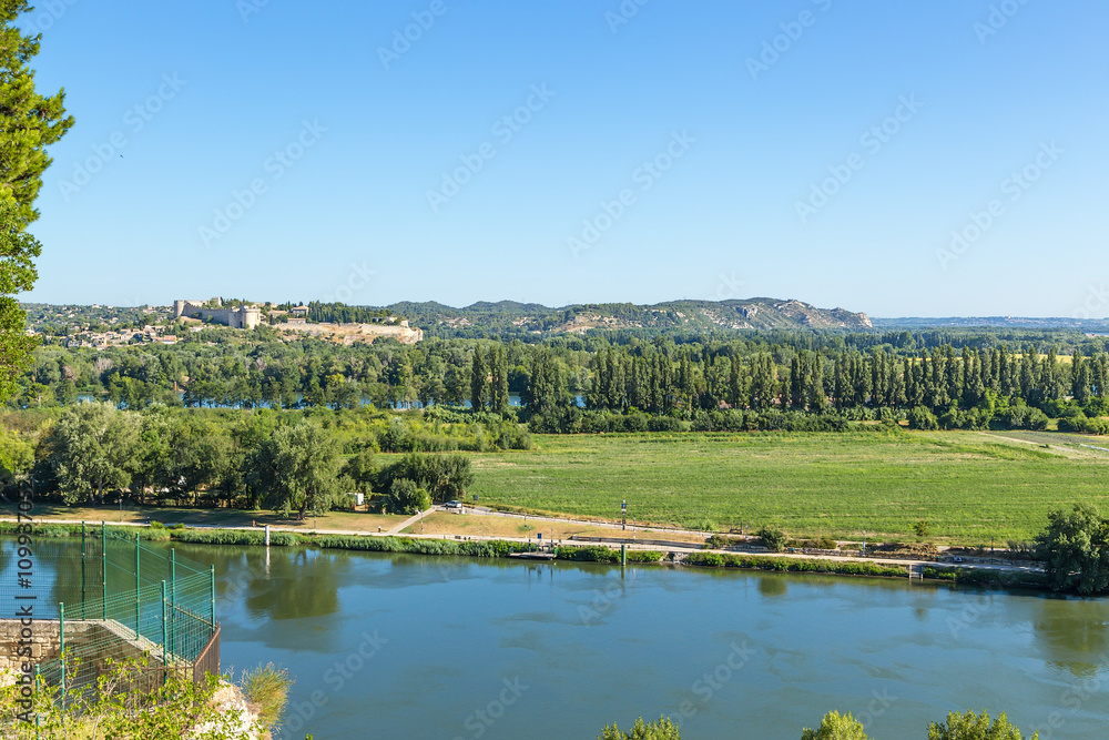 Avignon, France. The island on the Rhone River. In the background St. Andre Fort